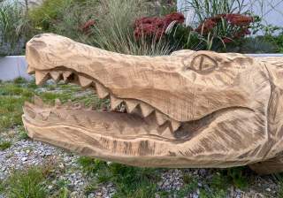 Massivholz-Schnitzerei der Firma Rudolf Spielplatz, Spielplatzbauer, Spielplatzhersteller, Spielplatzgeräte, Schweiz